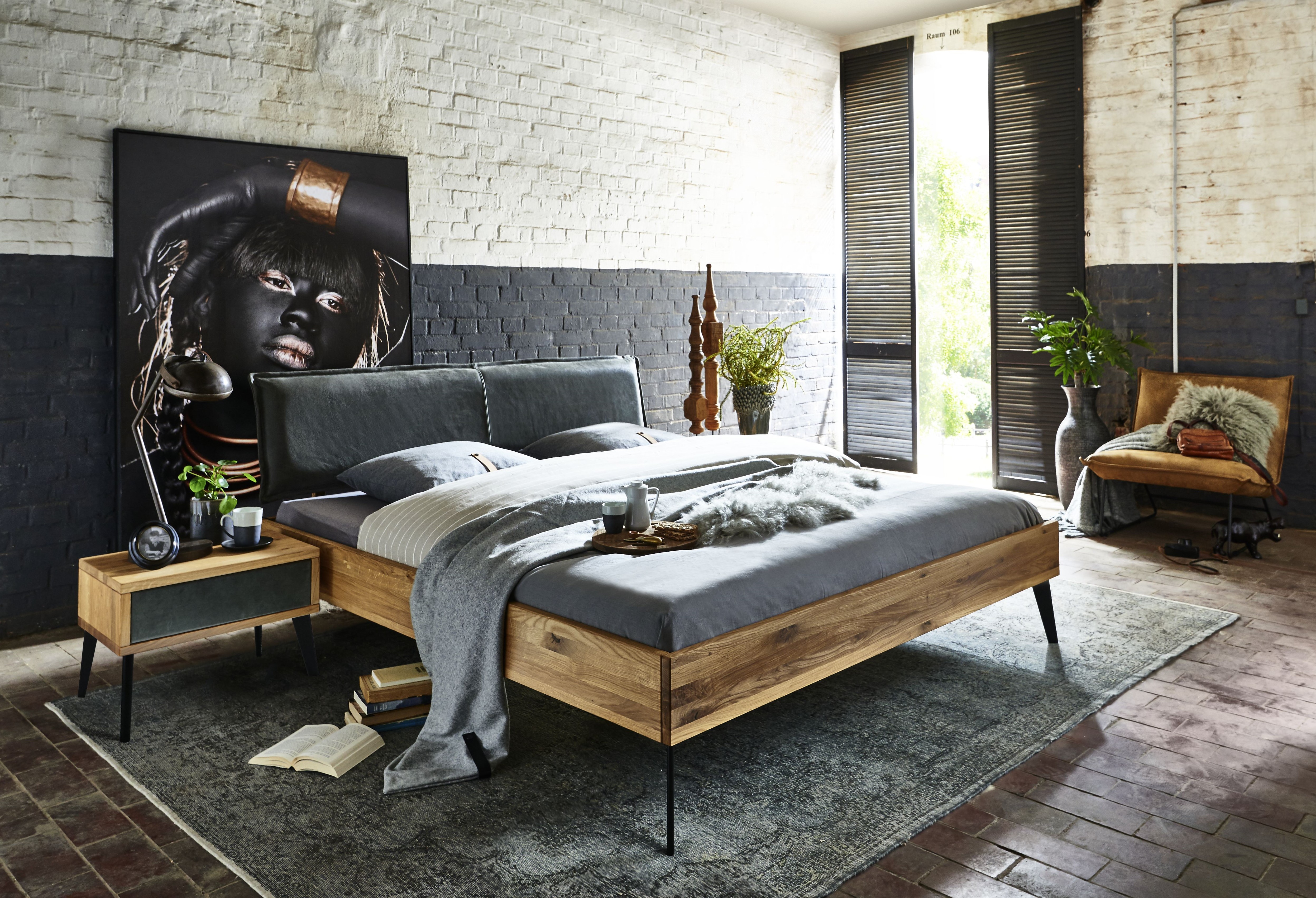 Double bed in solid oak with leather from Tjoernbo